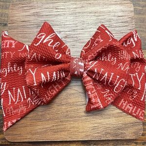 Christmas bow. Naughty red bow